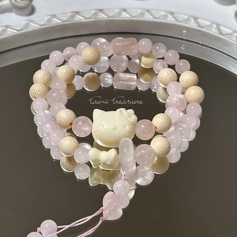 tx312-双圈粉水晶金丝竹白玛跑环爱心流苏象牙果kt猫头手串