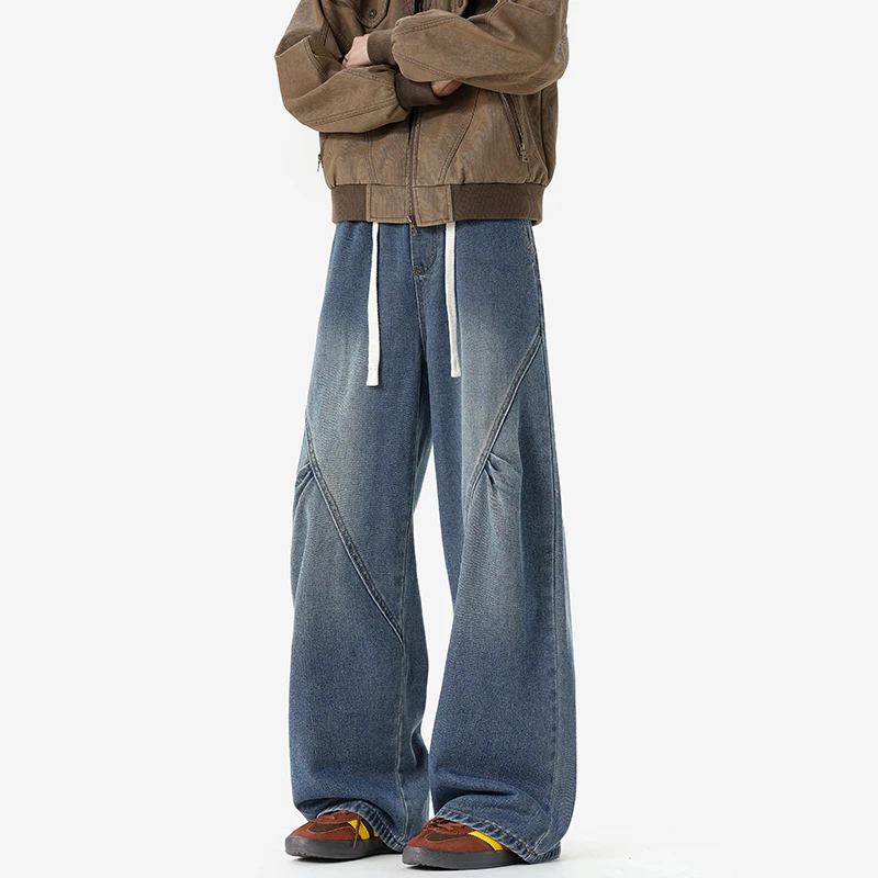 美式复古解构拼接斜切牛仔裤男士2025百搭高街直筒阔腿休闲裤男款