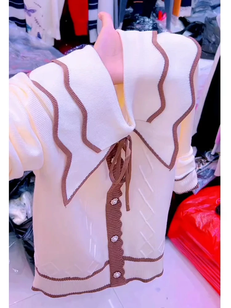 韩版复古小众荷叶领长袖针织衫上衣女秋冬季软糯蝴蝶结套头毛衣