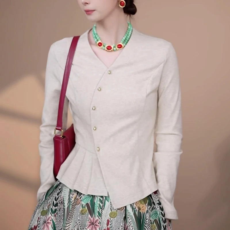 2025秋季新款女长袖V领衬衫高级感洋气减龄收腰显瘦不规则上衣