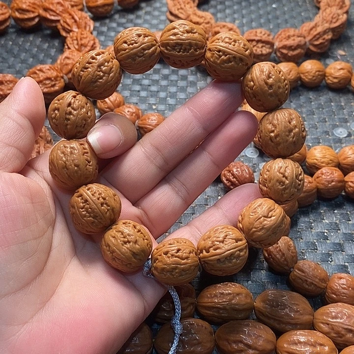 尼***蛋文玩核桃手串蚂蚁纹