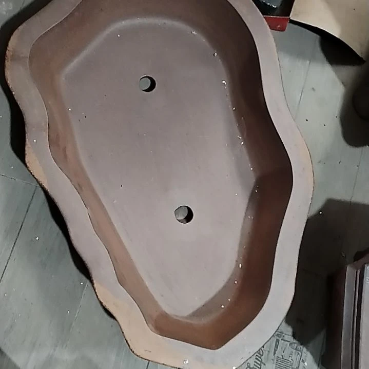 呵****3宜兴原矿紫砂花盆