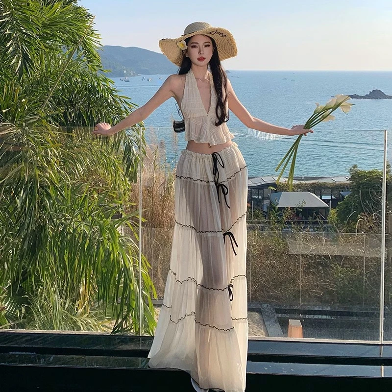 泰兰德度假穿搭设计氛围感透视褶皱V领挂脖背心露背半身裙套装女
