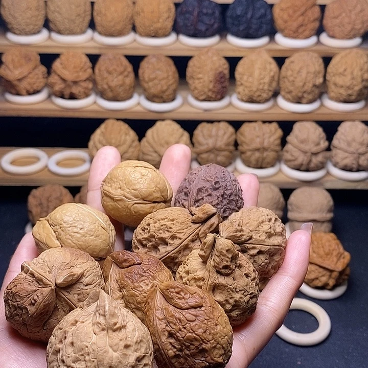 金***祥桃核吊坠六对异形