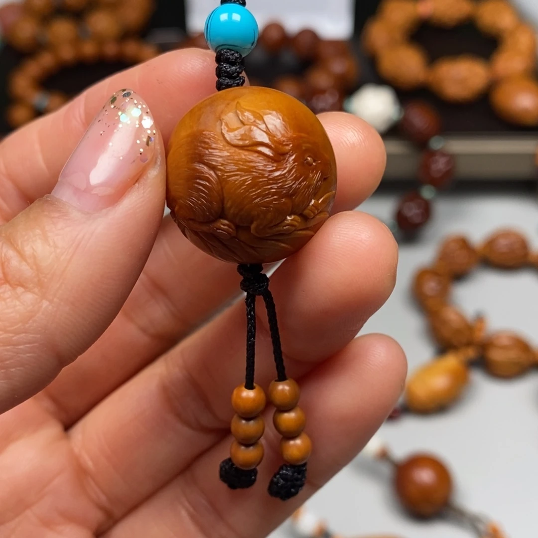 橄榄核吊坠轻****6兔子单子