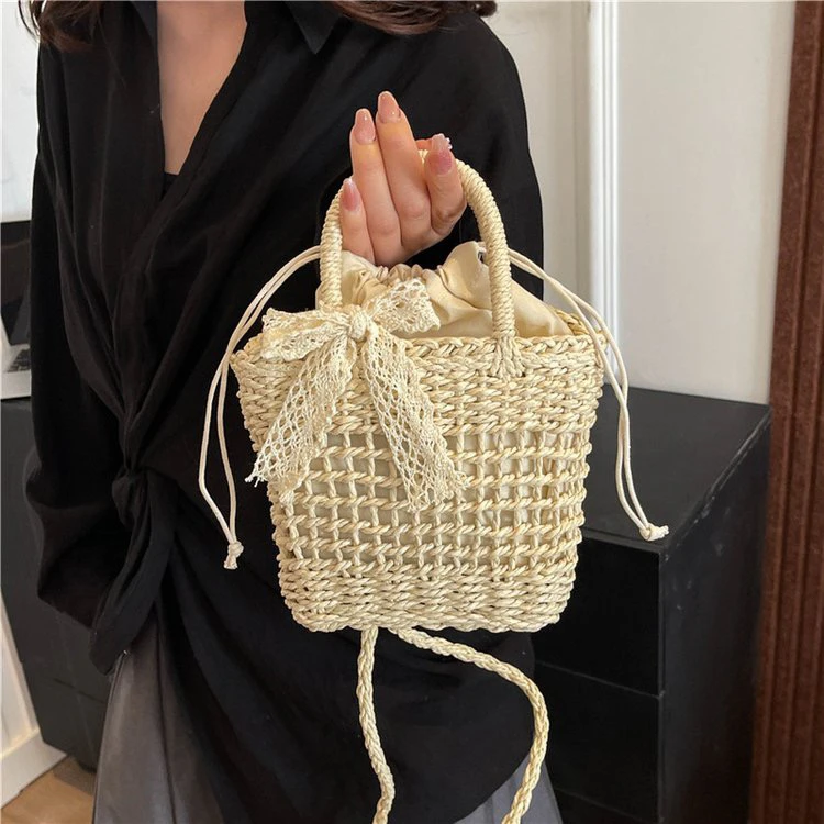 沙滩草编包包女2025新款夏海边度假编织包手提水桶包手机斜挎小包
