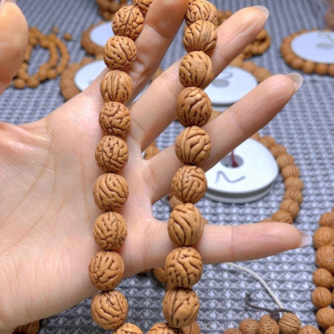 晨****桃核手串88888888