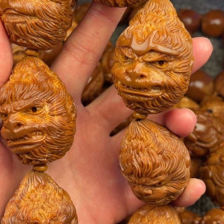 橄榄核吊坠铜****店橄榄核