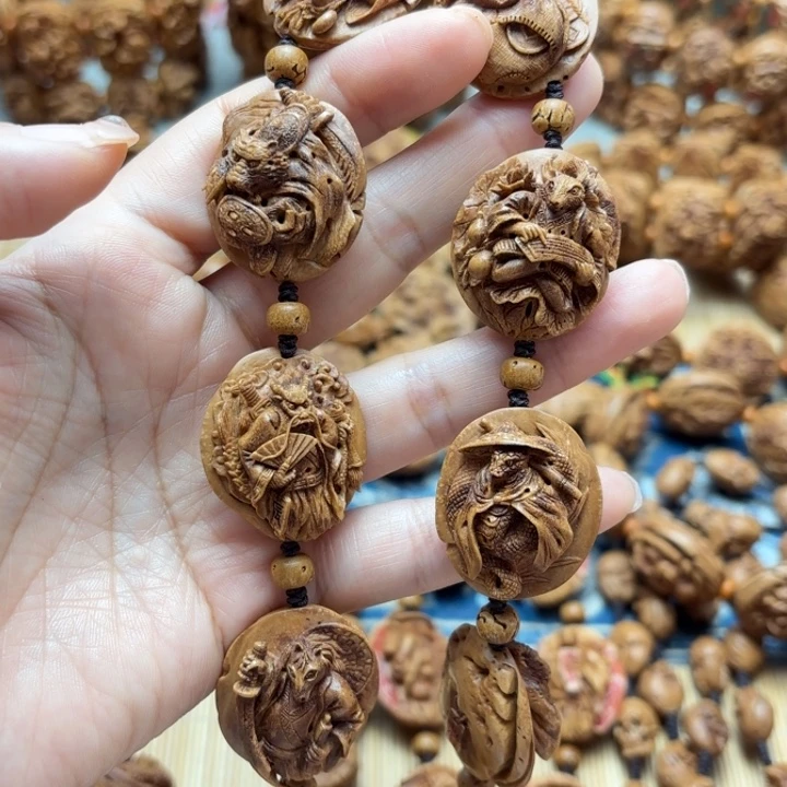 3***叔桃核雕刻十二生肖手持