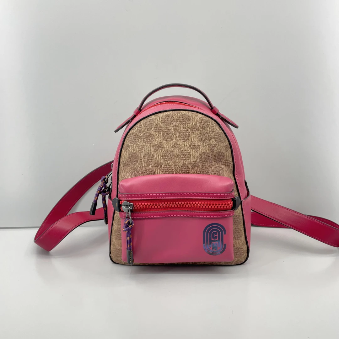 95新 COACH/蔻驰 玫红拼老花小号双肩包22*26*10cmD121311