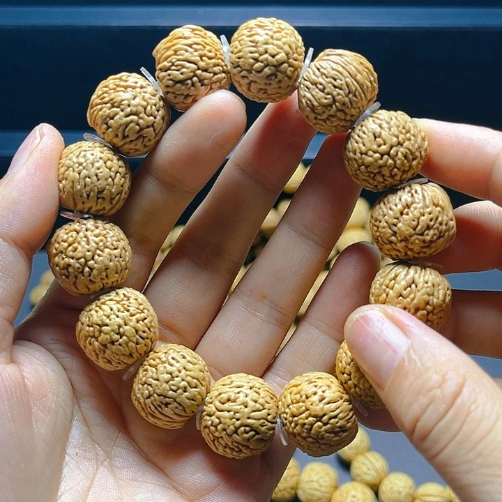 桃核吊坠龙鳞凤尾