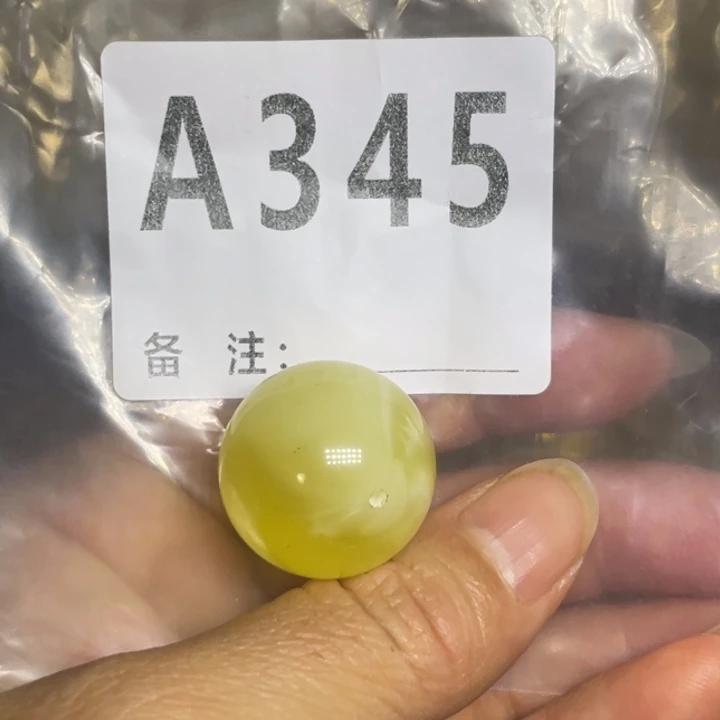 琥珀未镶嵌裸石微瑕23.2气泡
