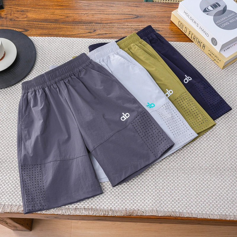 儿童夏休闲短裤中大童纯色户外速干网眼拼接五分裤男女童百搭裤子