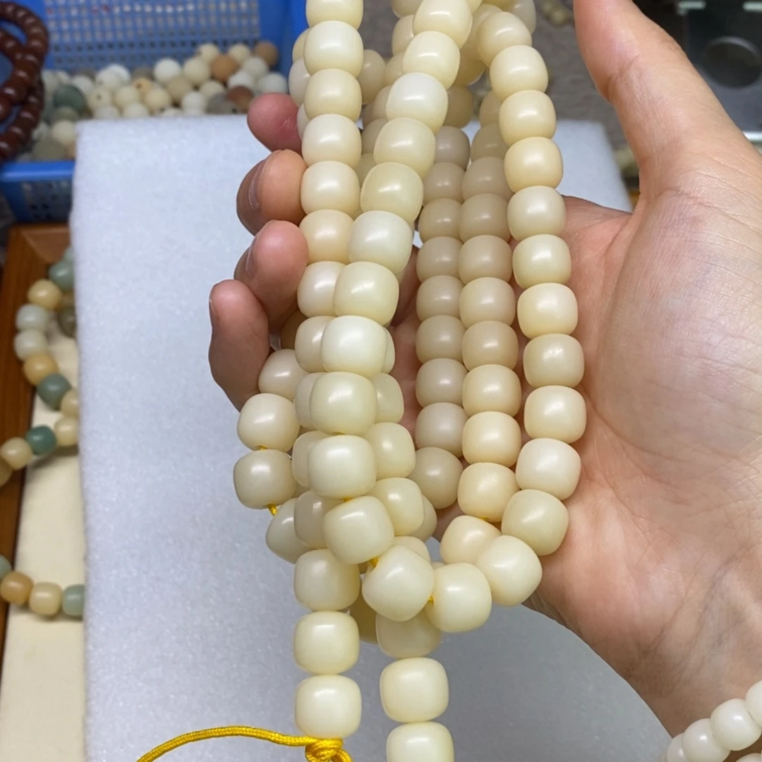 妮***妮菩提根/象牙果把件妮