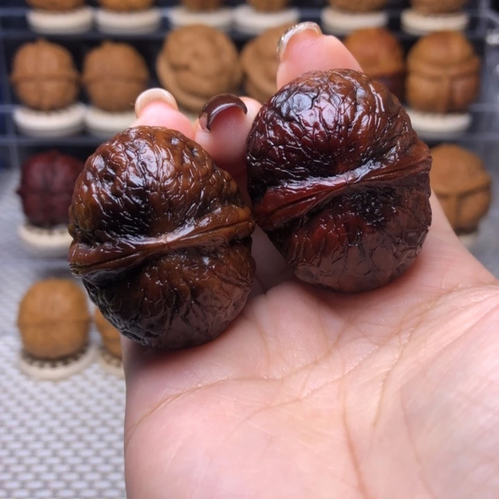 文玩核桃把件84号墨玉猫眼38➕尺