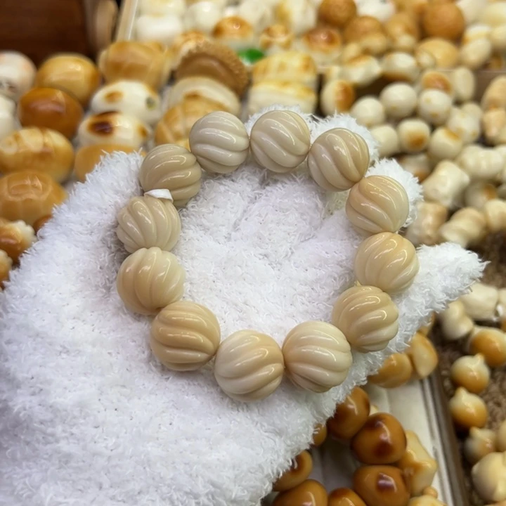 把件菩提根/象牙果75 象牙果原果雕刻溏心扭扭珠微瑕