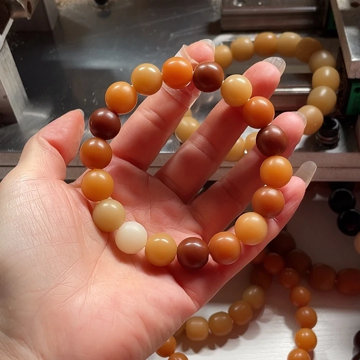 辛***墨吊坠菩提根/象牙果