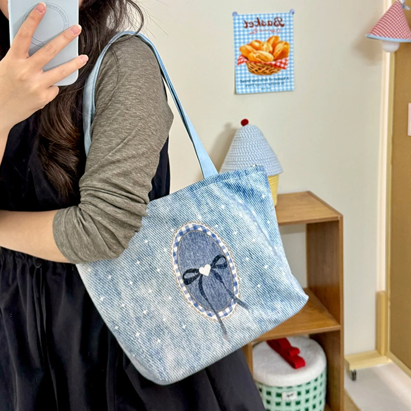 星星蝴蝶结帆布包妈咪包ins上班上课通勤包包ins手提袋上班专用