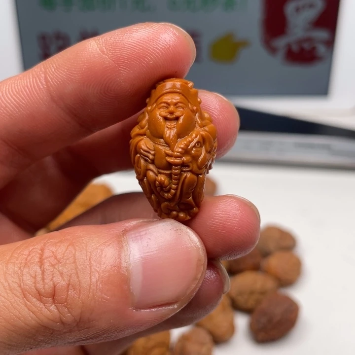 橄榄核吊坠橄榄核雕刻单子。