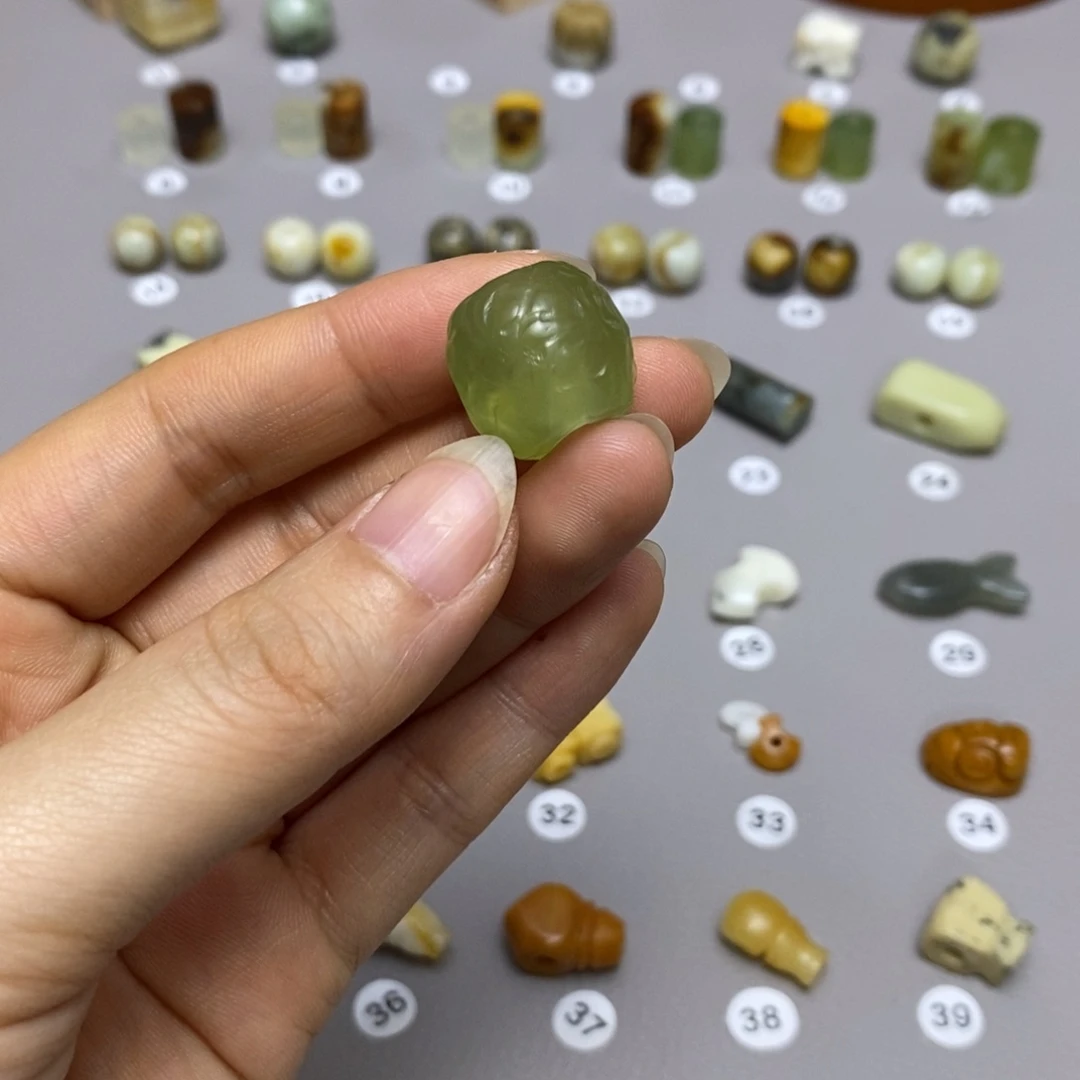 蛇纹石玉配饰合金简*