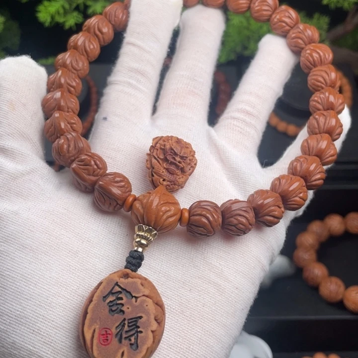 朝***阳吊坠桃核精品手持
