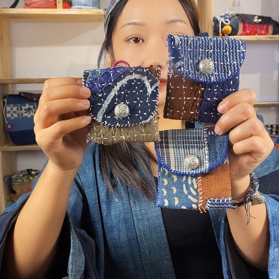 a***p织绣手工制作工艺包包