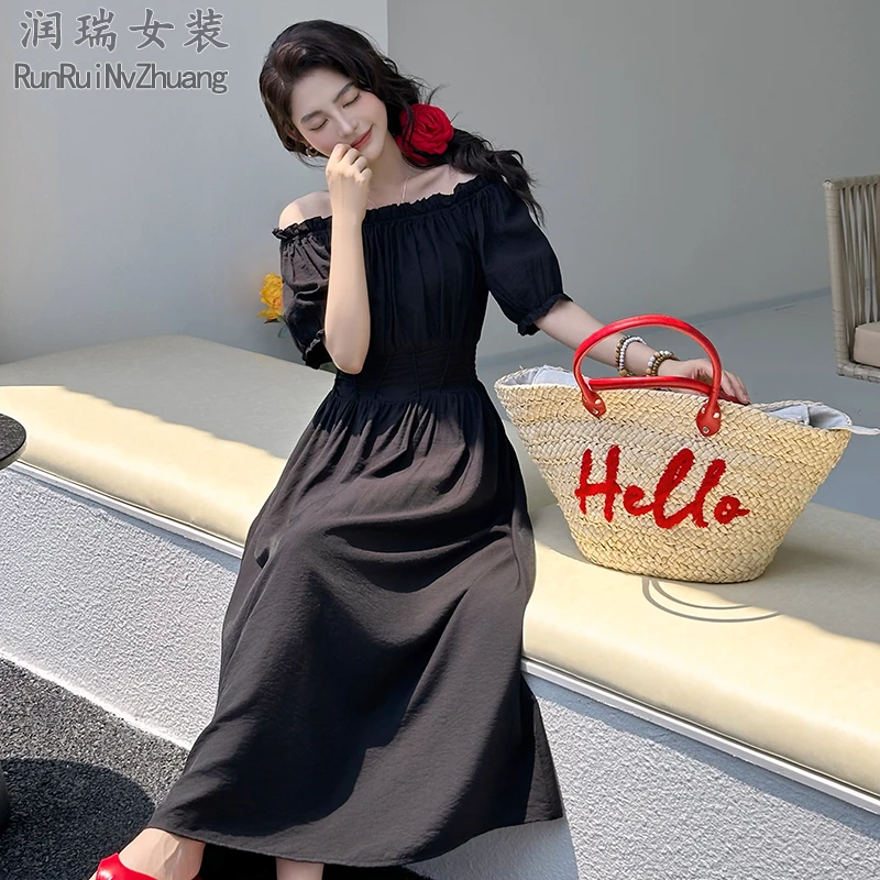 法式辣妈泡泡袖连衣裙2025夏季新款A字裙一字肩黑色优雅收腰长裙