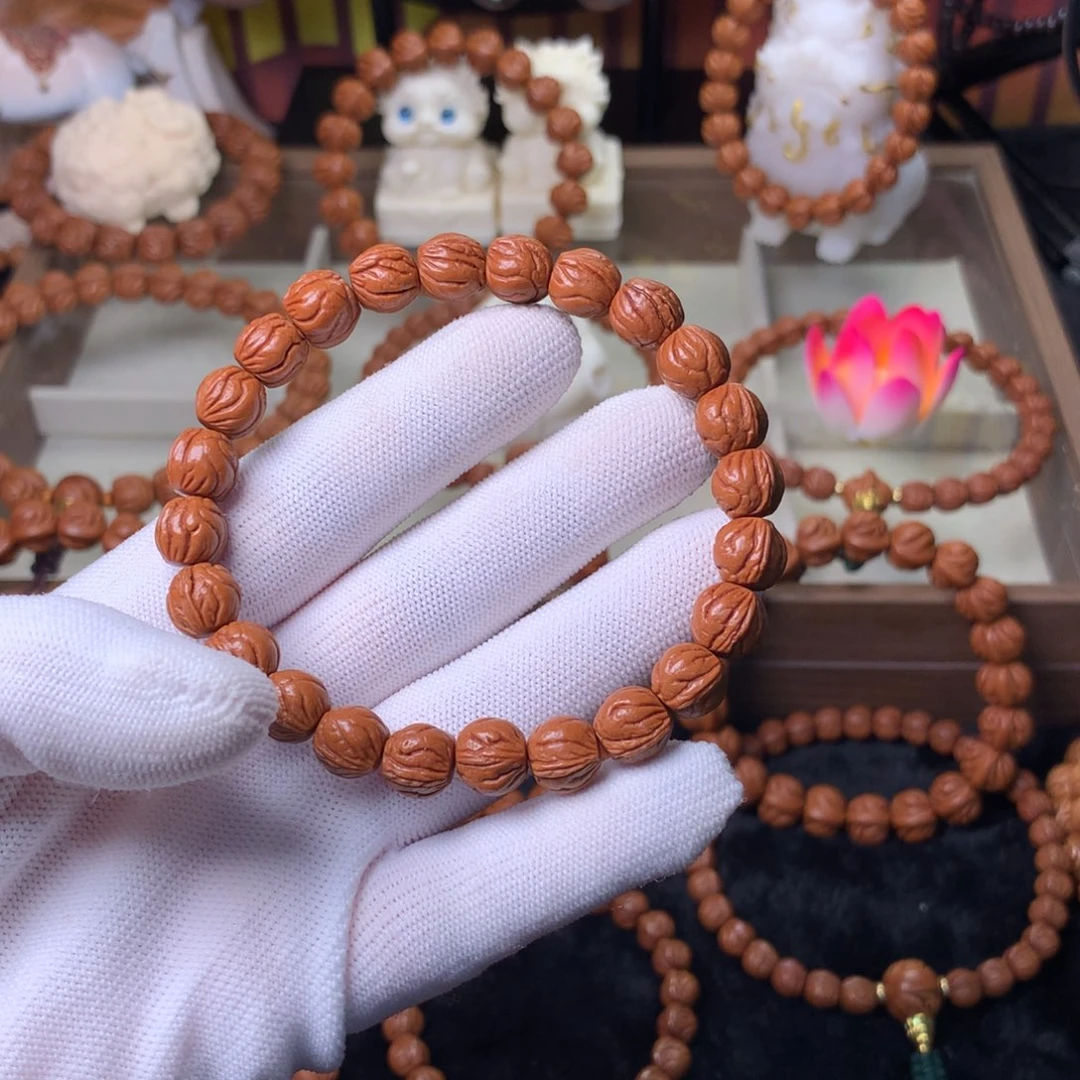 @***好桃核吊坠玉龙脊手串10