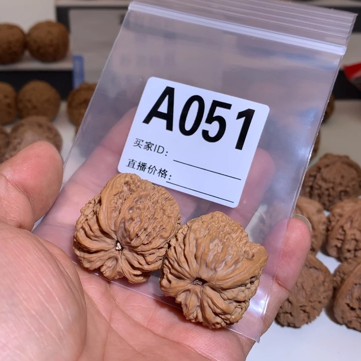 桃核把件h***w南疆石处理