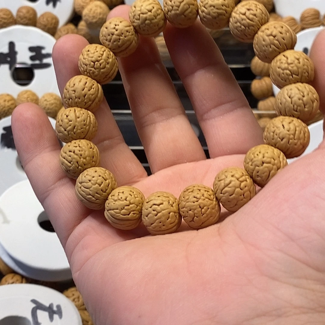 玄***.吊坠桃核金丹15….