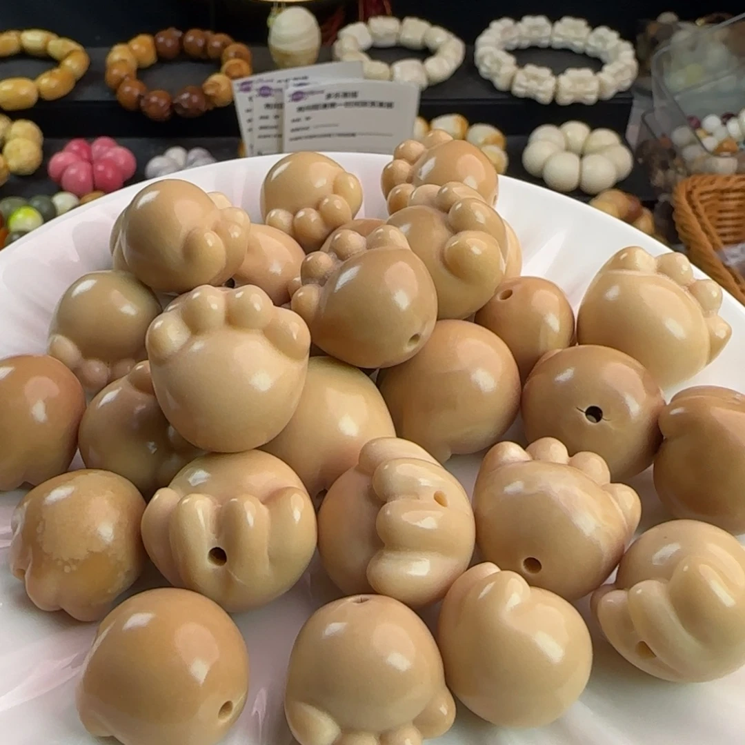 吊坠菩提根/象牙果微瑕疵奶茶色猫爪6颗（大小随机）