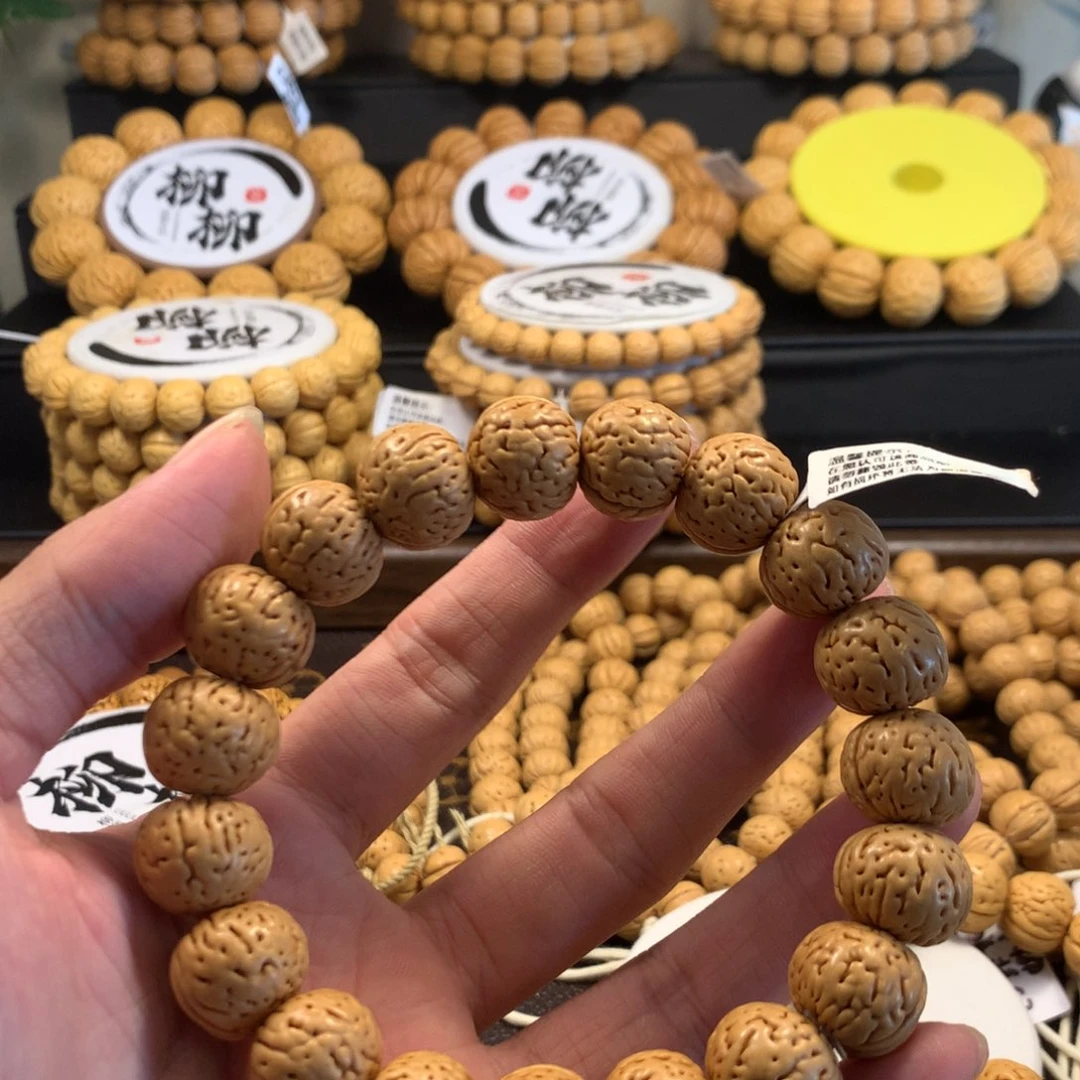 S***生精品桃核金丹手串