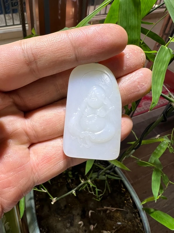 新疆和田玉白玉纯手工雕刻弥勒佛