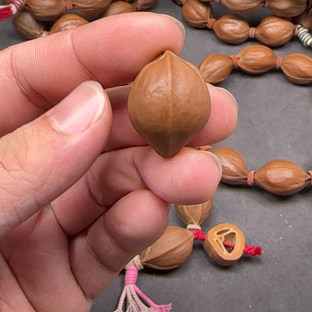 橄榄核手串1.9 头货 三通