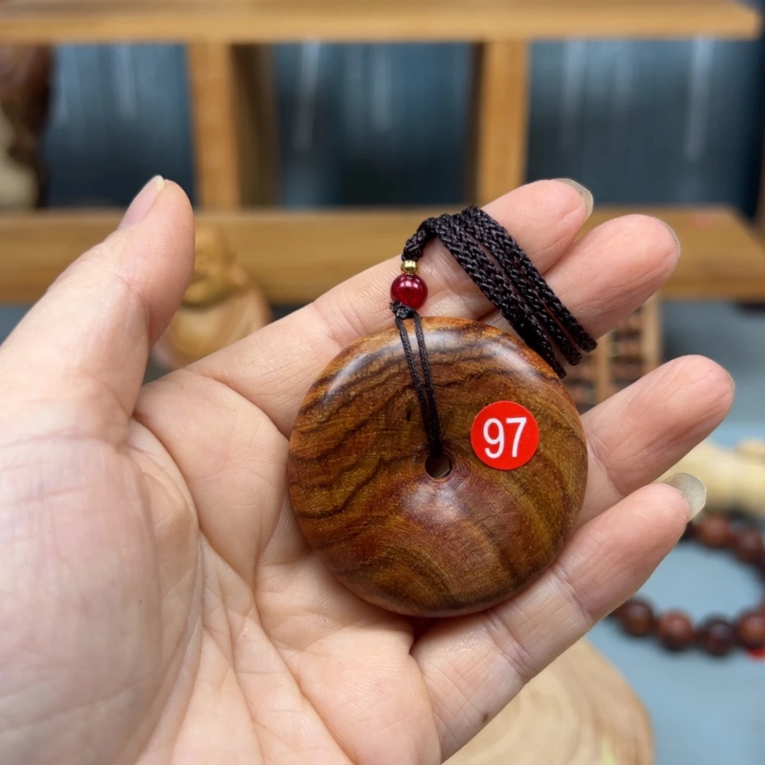 用***3木海南黄花梨新料平安扣