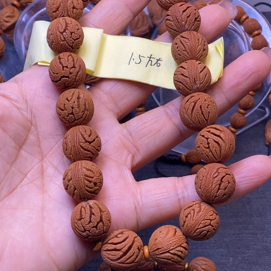 尊***发秦岭龙纹桃核手串