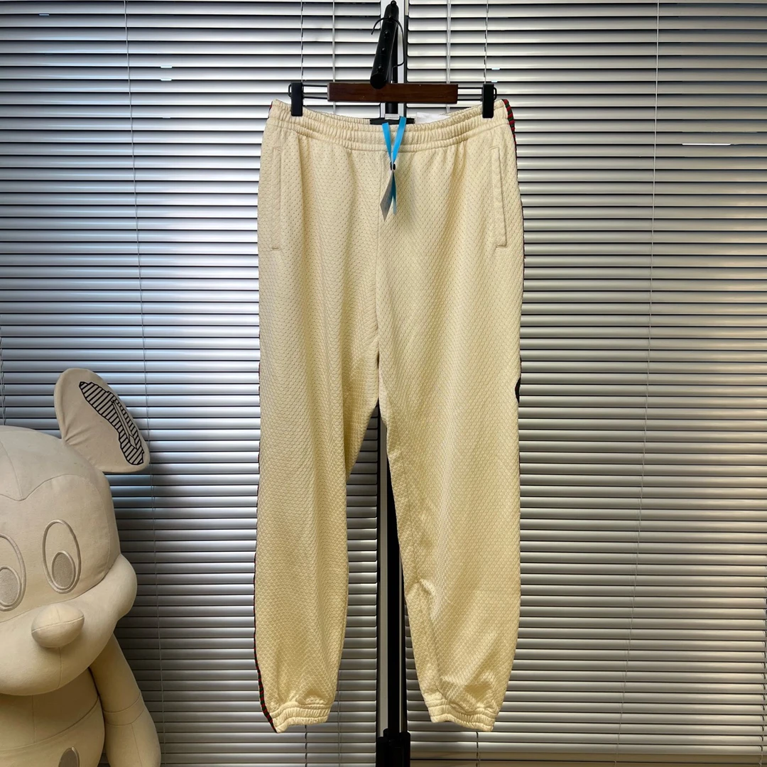 99新 GUCCI/古驰 浅黄色侧条纹运动长裤 S码 95新 ys000042