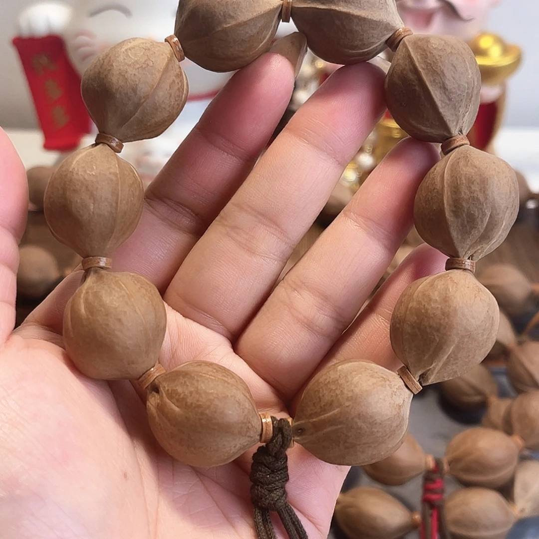 阿***说橄榄核手串/手链梅林