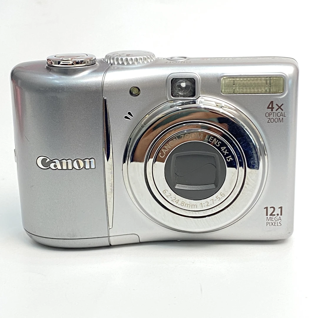95新 Canon/佳能 a1100自备五号电池1200w像素4x光变ccd数码相机
