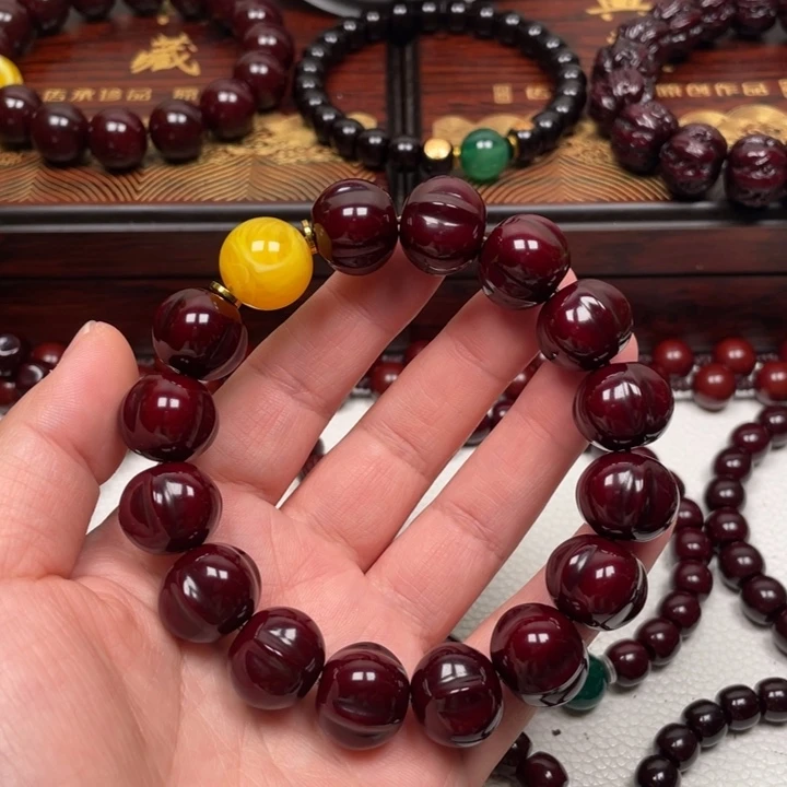 坚***持吊坠橄榄核猴头手串