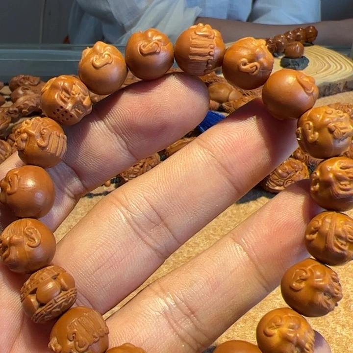 扎***哥手串/手链橄榄核橄榄核雕刻的作品