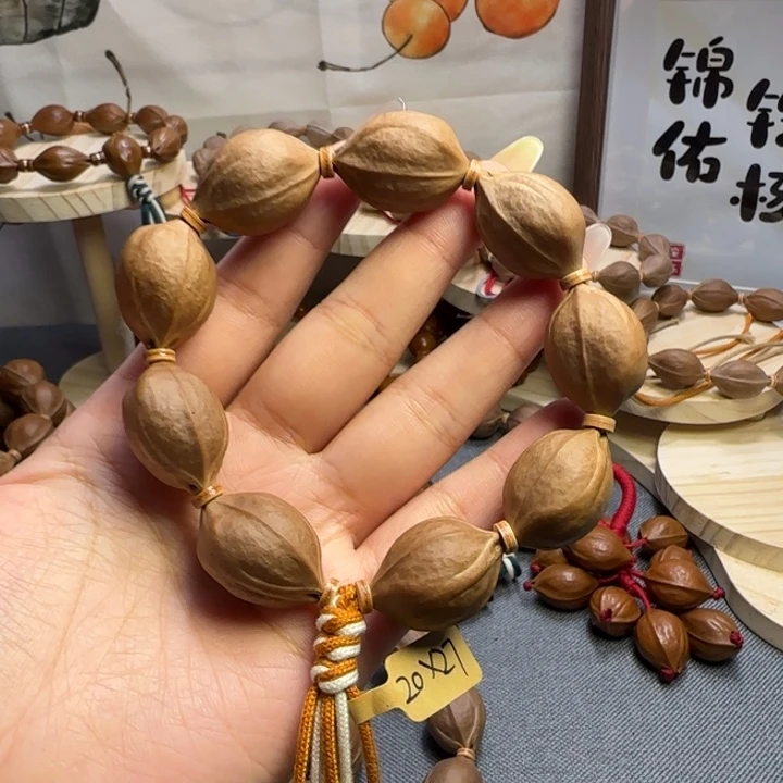 雨***手串橄榄核梅林铁核三花鲨鱼背
