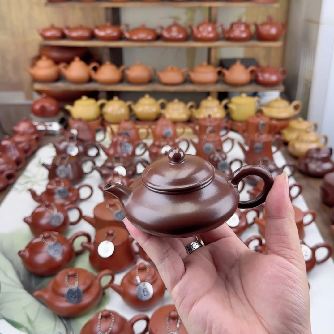 二***管茶壶紫砂110cc紫泥虚扁壶