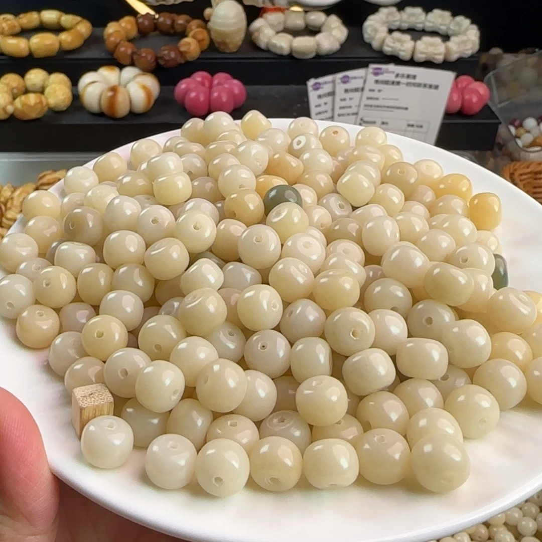 吊坠菩提根/象牙果微瑕卡10奶白桶1000颗批发