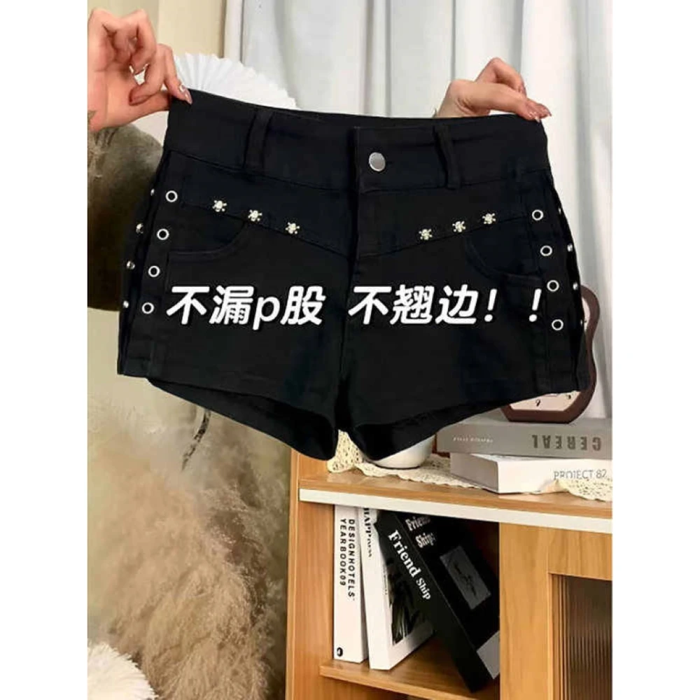 美式辣妹紧身包臀超短牛仔裤女春夏黑色柳丁设计感高腰工装热裤子