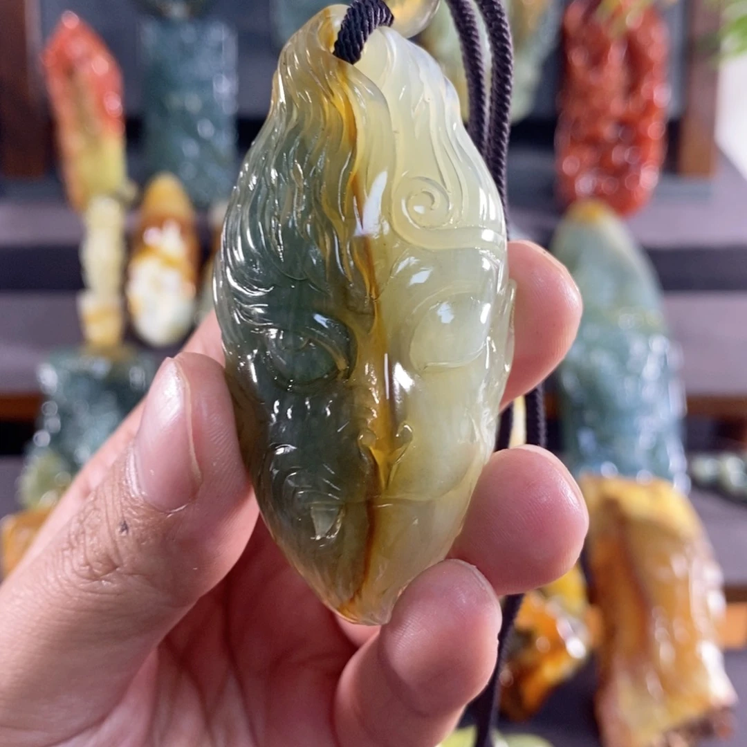 岫玉未镶嵌花玉挂件九*。