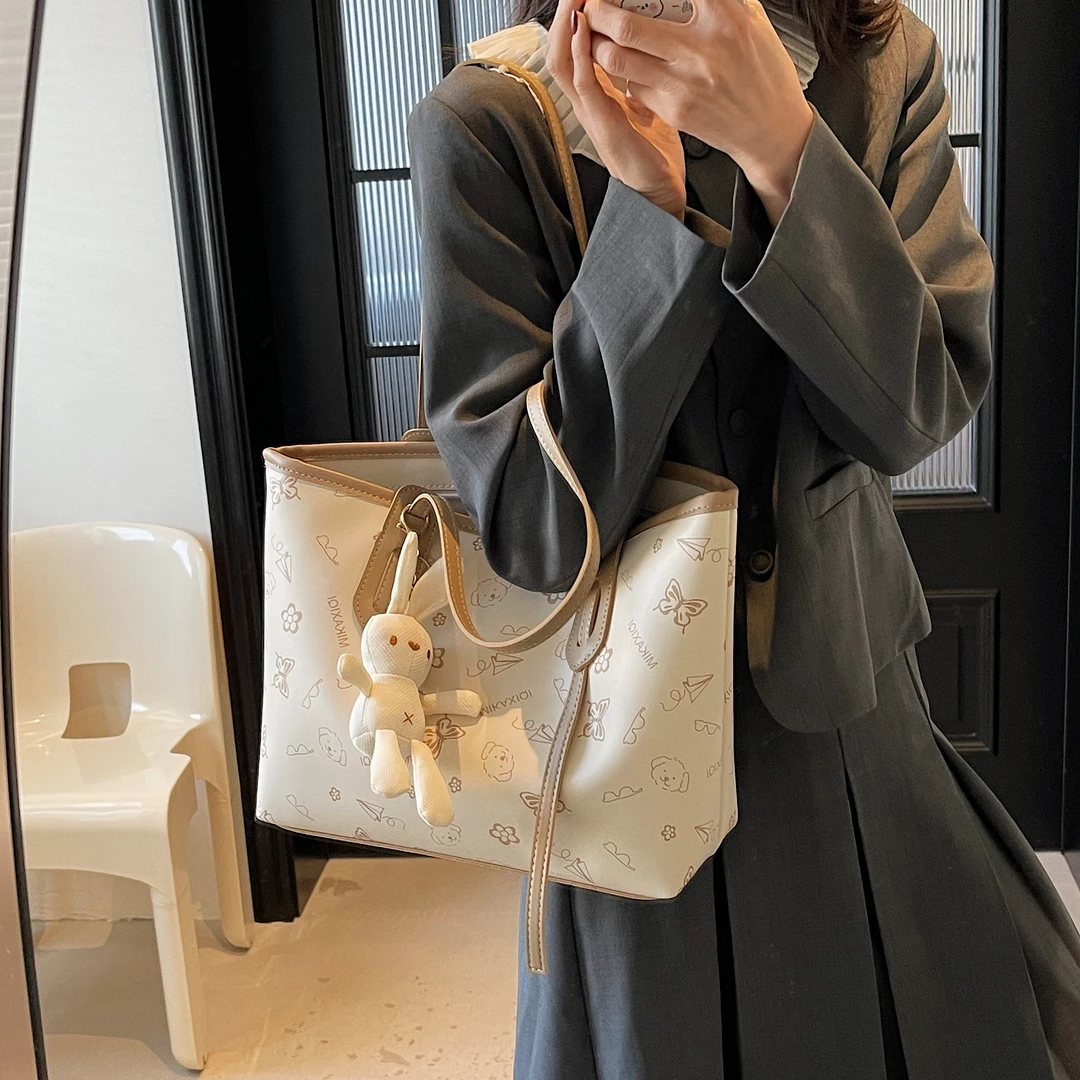 3546大容量包包女春夏季节新款百搭休闲印花单肩通勤手提单肩包