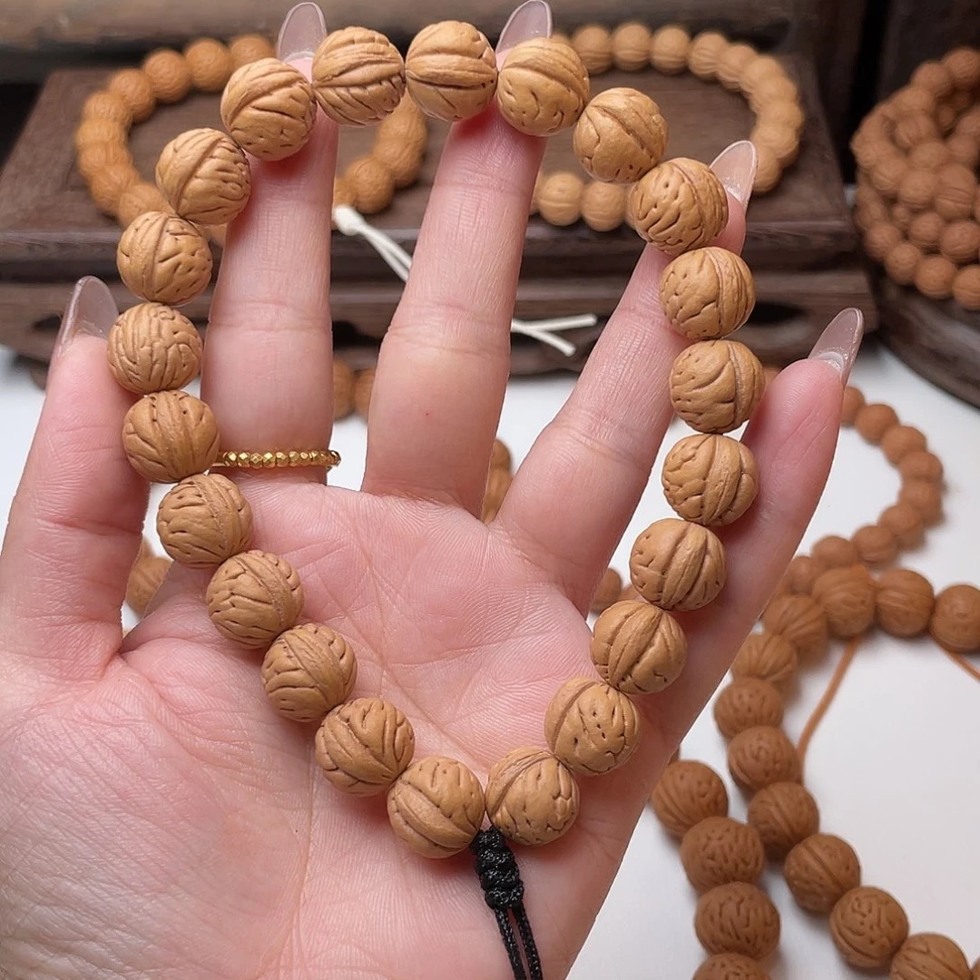 12加野生大肠纹桃核手持