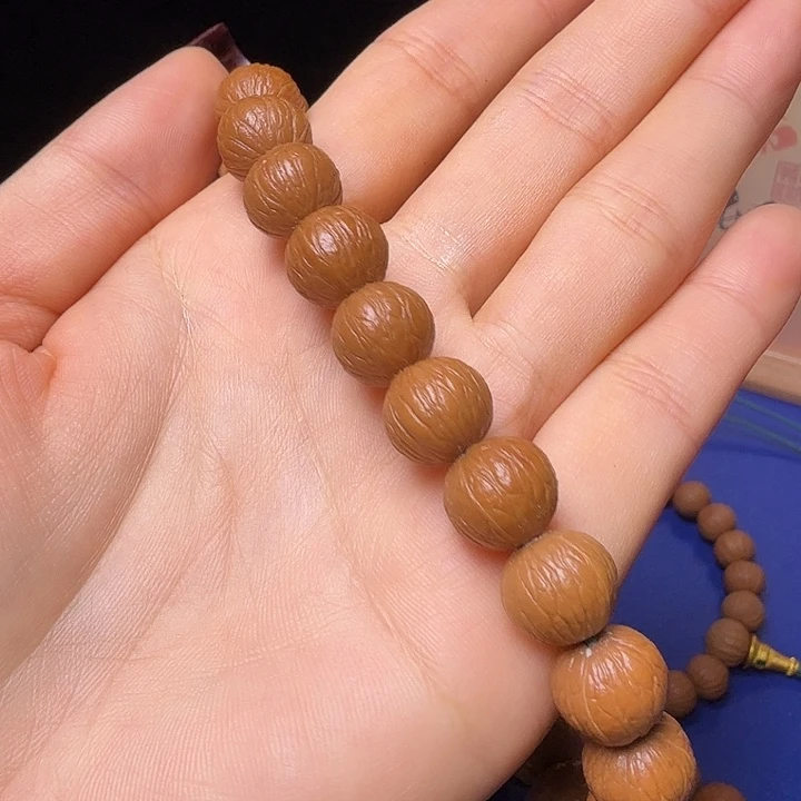 知***乐猴头核桃吊坠凤羽