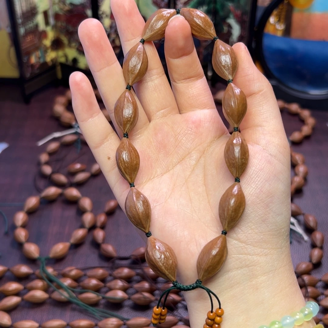 橄榄核手串/手链老油核 红皮三角 1.25 2.4左右 手持